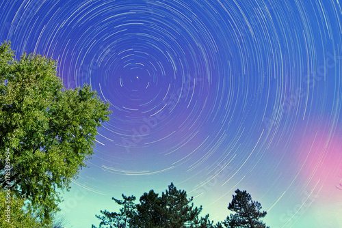 Geomagnetic storm hits Earth November 5, 2025: Aurora with stars and colorful sky. Caused by a coronal mass ejection (CME) that erupted from the sun