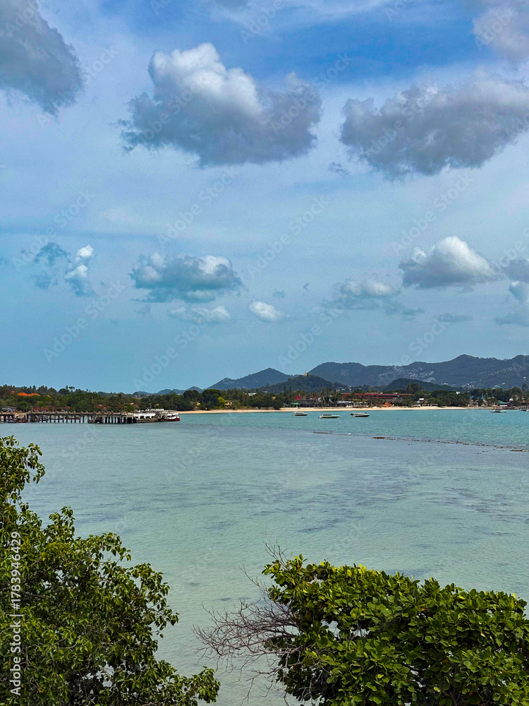 Fototapeta premium Quiet sandy beach on a beautiful sunny landscape in Koh Samui Island, Thailand