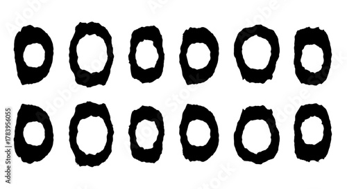 Set of twelve hand-drawn black ink brush stroke circles. Abstract grunge rings and round frames for design elements, isolated on a transparent background