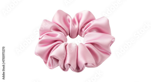 Soft pink satin scrunchie hair accessory isolated on black