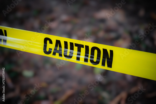 Yellow caution tape forest woods grounds outdoors warning danger barrier