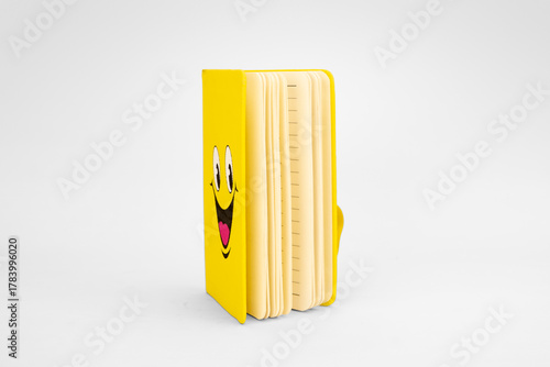 Yellow Notebook with Smiley Face Design Isolated