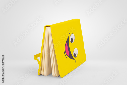 Yellow Notebook with Smiley Face Design Isolated