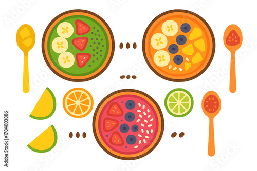 Colorful assortment of fruit smoothie bowls with fresh toppings and spoons