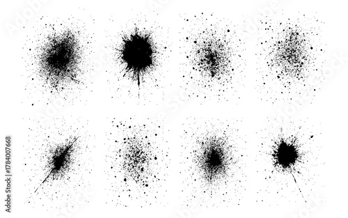 Abstract black ink splatter set with grunge textured effects on white background