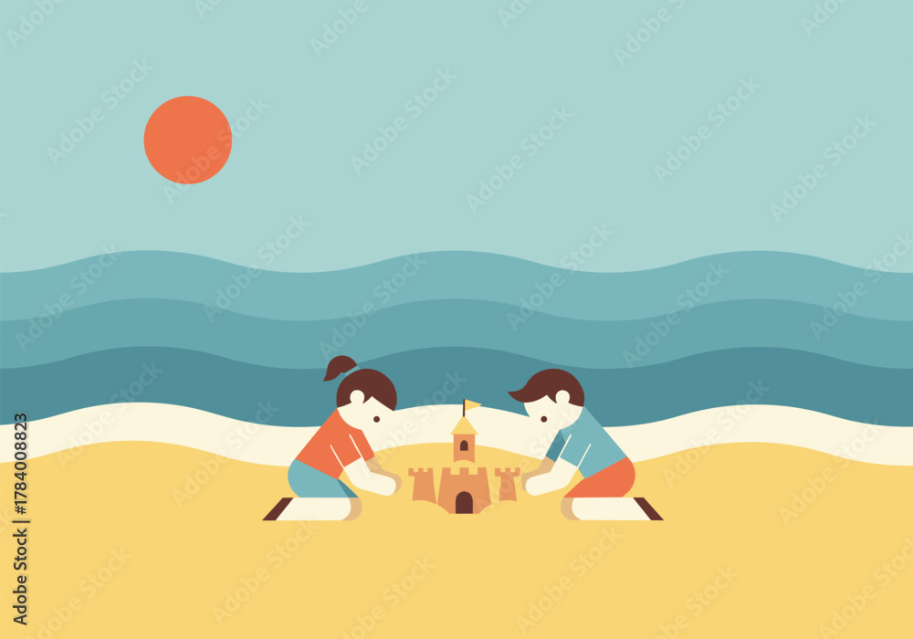 Fototapeta premium Children building sandcastle on sunny beach with waves in background