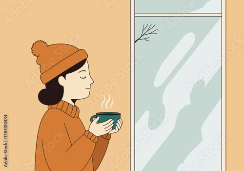 Cozy winter morning: woman enjoying hot beverage indoors