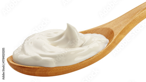 Sour Cream on wooden spoon, mayonnaise, yogurt, isolated, full depth of field