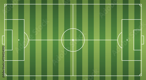 Top view of a green striped soccer field with white lines and goals football field sport