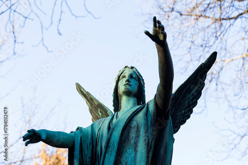 Historic Statue on the autumn mystery old Prague Cemetery, Czech Republic