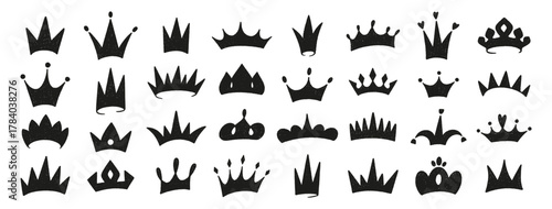 Crowns crayon icons set. King or queen crown silhouettes. Black doodles on white bg. Hand drawn prince and princess head accessories. Royal diadem, majestic tiara. Sketch of luxurious symbols, vector