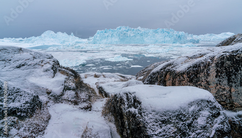 Wallpaper Mural Giant icebergs floating in Ilulisat icefjord, Greenland. Massive icebergs, calved from the Sermeq Kujalleq Glacier, float through the Ilulissat Icefjord in western Greenland Torontodigital.ca