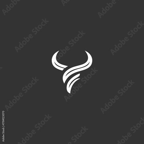 A stylized bull's head illustration on a dark background viewed from the front