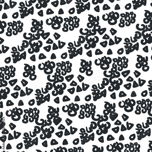 Small spots and rounded dense shapes form an abstract background.