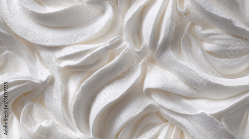 Elegant seamless pattern of smooth, whipped cream texture