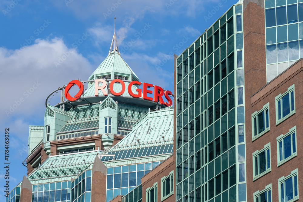 Fototapeta premiumToronto, ON, Canada - November 8, 2025: Rogers Building in Toronto, Ontario, Canada. The Rogers Building is part of the corporate campus of Canadian media conglomerate Rogers Communications. 