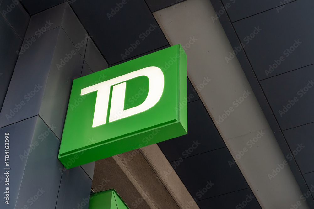 Fototapeta premium Toronto, ON, Canada - November 8, 2025: Close up of TD (Toronto Dominion Bank) logo on the building is seen in Toronto, ON, Canada. 