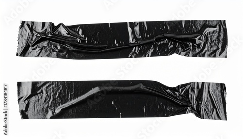 Two pieces of black crumpled adhesive tape on a white background, isolated. Perfect for textures, backgrounds, or graphic design elements.