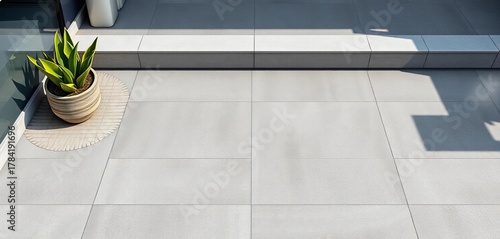 Large grey porcelain patio tiles, textured surface, modern design, exterior, porcelain