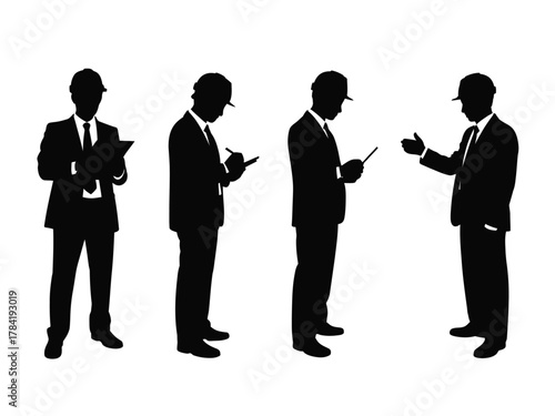 Four black silhouette men in suits and hard hats engineers