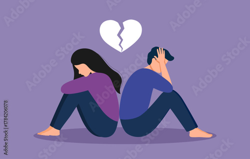 Sad loving couple sitting with broken heart pieces. Breakup or divorce problem.