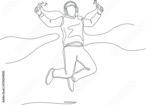 Athlete crosses finish line in triumphant celebratory jump with arms raised