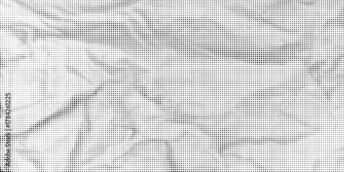 Halftone faded gradient texture. Grunge halftone grit background. White and black sand noise wallpaper.