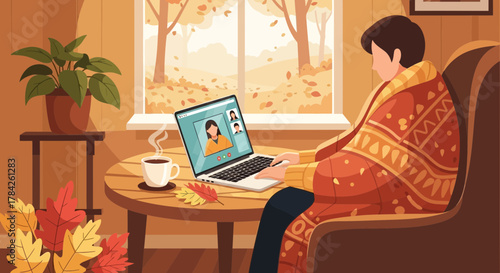 Cozy autumn video call: Relaxing at home with a warm blanket, coffee, and laptop for connection and conversation during fall season with calming nature view