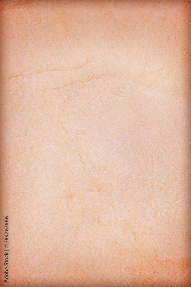 Fototapeta premium Textured brown old paper background with grunge surface detail and a macro pattern