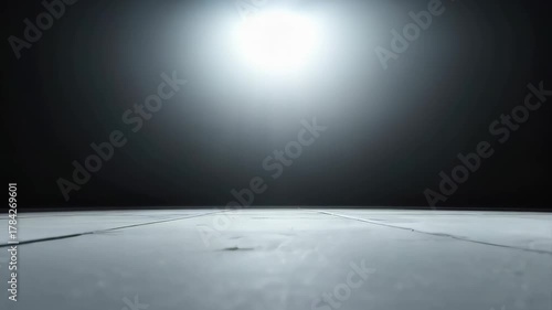 Dark Studio Stage Spotlight Illuminating Concrete Floor Dramatic Lighting Empty Space Cinematic Atmosphere