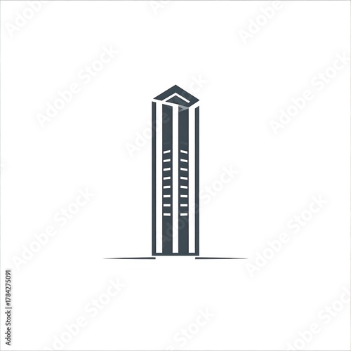 A tall, abstract representation of a skyscraper with a pointed top, featuring vertical lines and window outlines, standing on a simple base