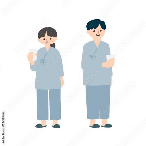 検査着を着た男女