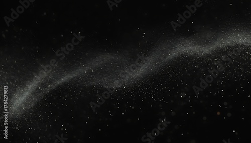 A dark scene showcasing subtle particles dispersed across a black background, with a prominent wave formation. Subtle golden details appear