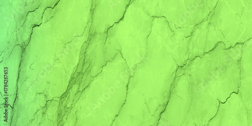Abstract lime green marble texture with dark veins, high-resolution seamless background for design.