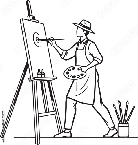 Artist painting on an easel in a studio