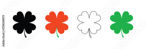 Four leaf clover silhouettes in black, orange, white and green representing luck