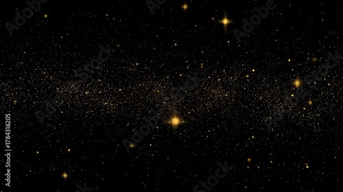 A dark background speckled with numerous, luminous golden particles, resembling stars or dust, creates a shimmering, celestial effect