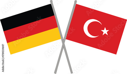 The national flags of germany and turkey are crossed in a display