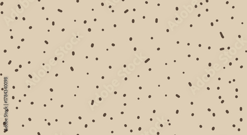 Abstract background with dark brown spots, creating a visually dynamic pattern
