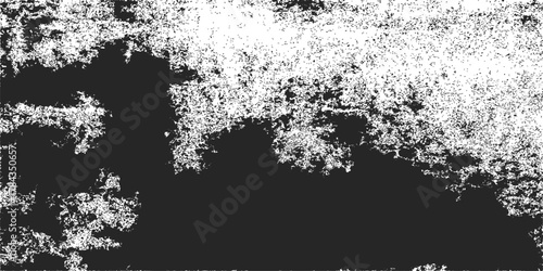 Black grunge vector silhouette of a polar bear with splatter and floral decoration in a dirty old frame