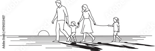 Family walking together on a sunny day with long shadows