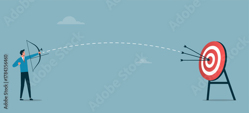 Businessman successfully hitting the target. Symbol of depicts success, hat trick, accuracy, on target, achievement, perfection, and accomplishment.