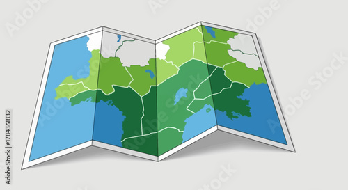 A folded map displaying various regions with different shades of green and blue, suggesting geographical divisions.
