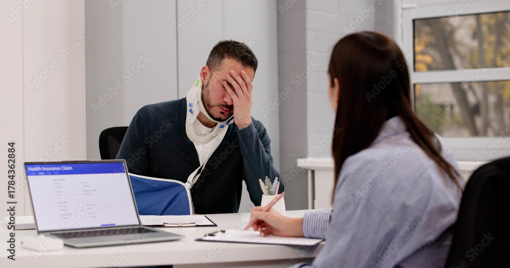 Fototapeta premium Injured Worker Seeks Compensation