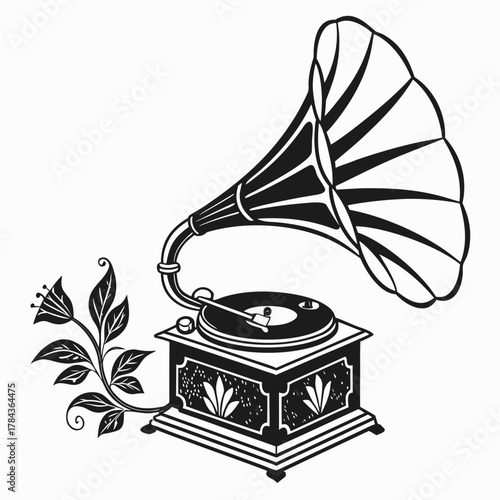 Black silhouette of an antique gramophone with floral embellishments