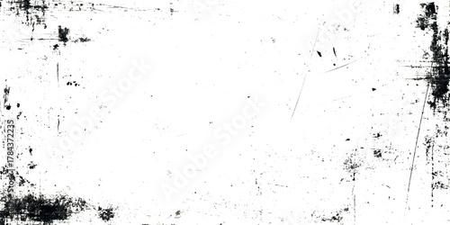 High-resolution black and white grunge texture with distressed ink splatter and rough distressed and subtle scratches.