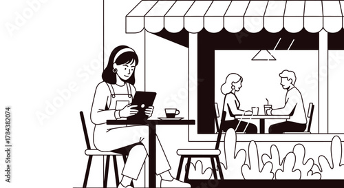 Woman using tablet at cafe outdoor seating digital lifestyle
