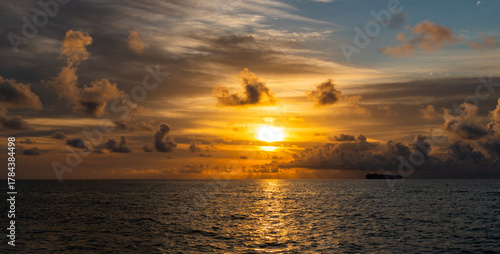 Fototapeta Naklejka Na Ścianę i Meble -  Calm horizon at sea nature. Romantic summer vacation on beach seascape. Sunrise sky horizon. Sea sunset view. Cloudy sunset sky and seascape at summer vacation. Skyscape with sea sunrise. Afterglow