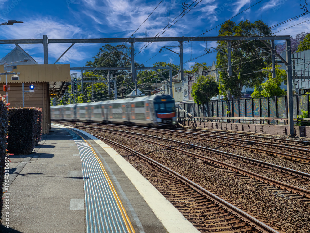 Naklejka premium Passenger Train going through Summer Hill train station a suburban Sydney train Station NSW Australia