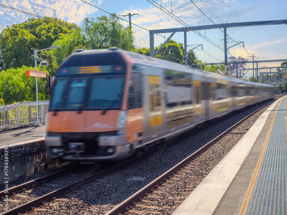 Fototapeta premium Passenger Train going through Summer Hill train station a suburban Sydney train Station NSW Australia